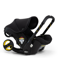 Doona Infant Car Seat Stroller + Essentials Bag | Midnight Special Edition