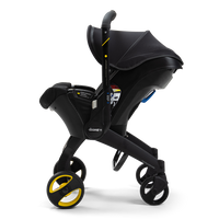 Doona Infant Car Seat Stroller + Essentials Bag | Midnight Special Edition